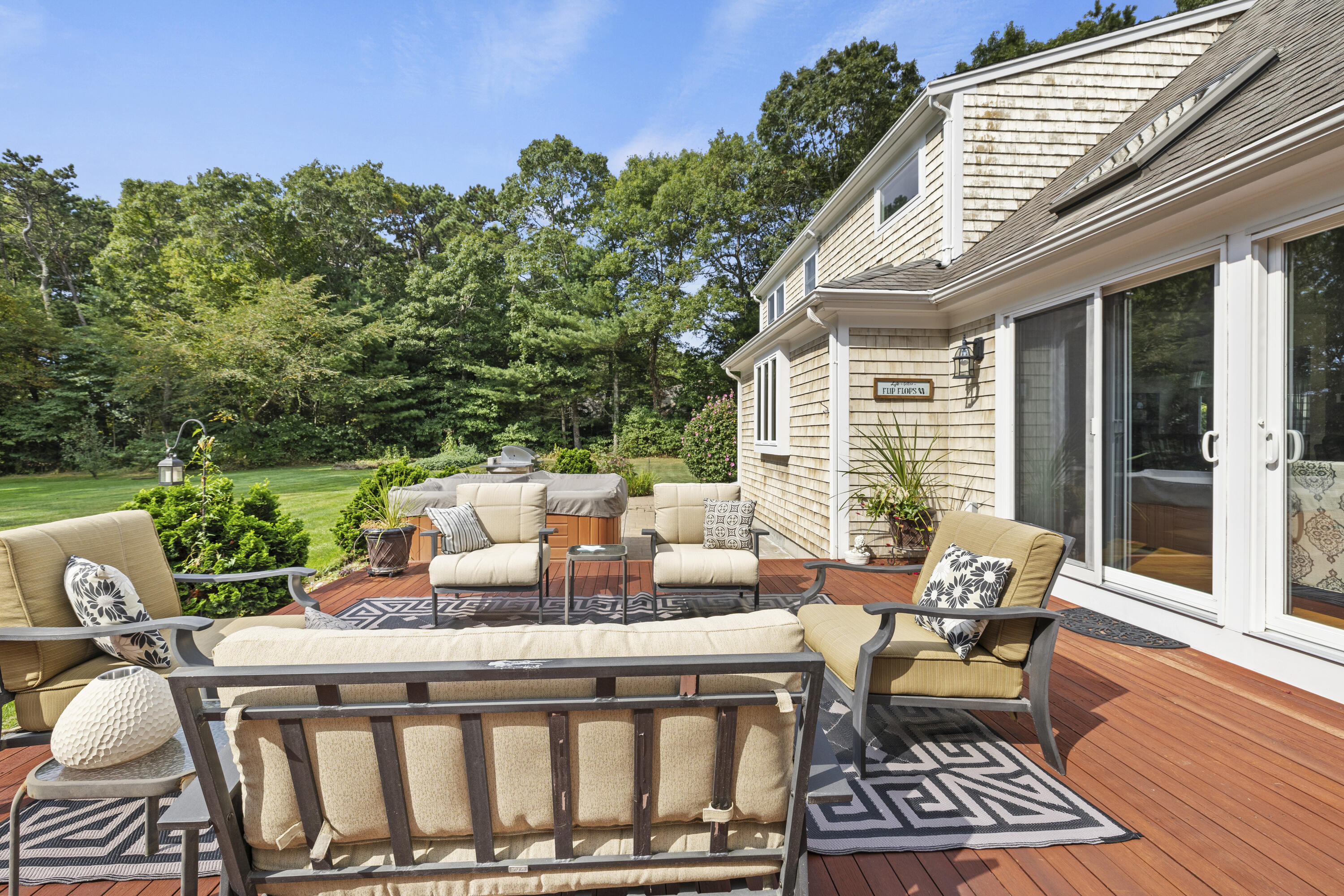 750 Old Barnstable Road Mashpee, MA 02649 - Photo 16 of 30 a view of a patio with couple of chairs