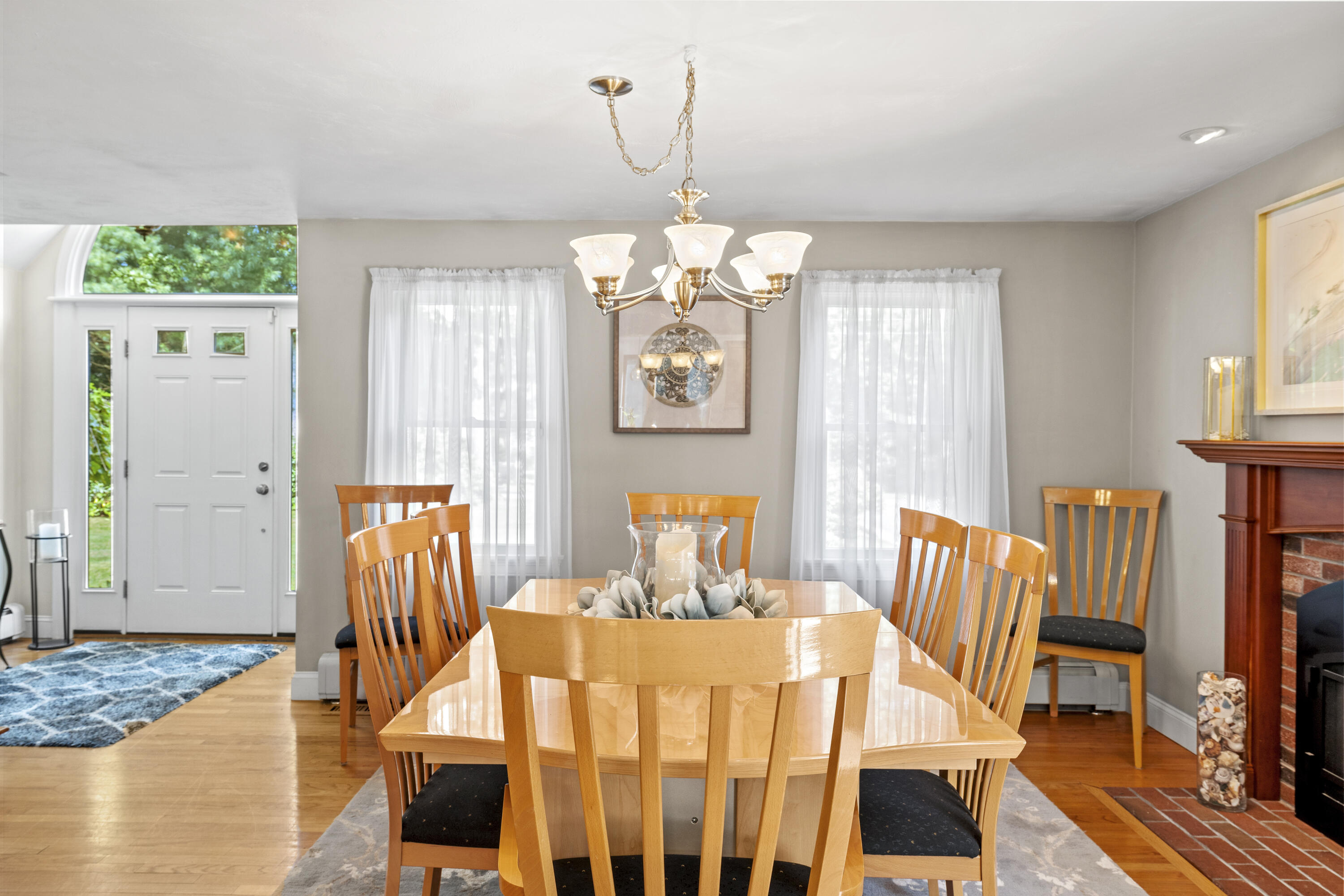 750 Old Barnstable Road Mashpee, MA 02649 - Photo 7 of 30 a view of a dining room with furniture window and wooden floor