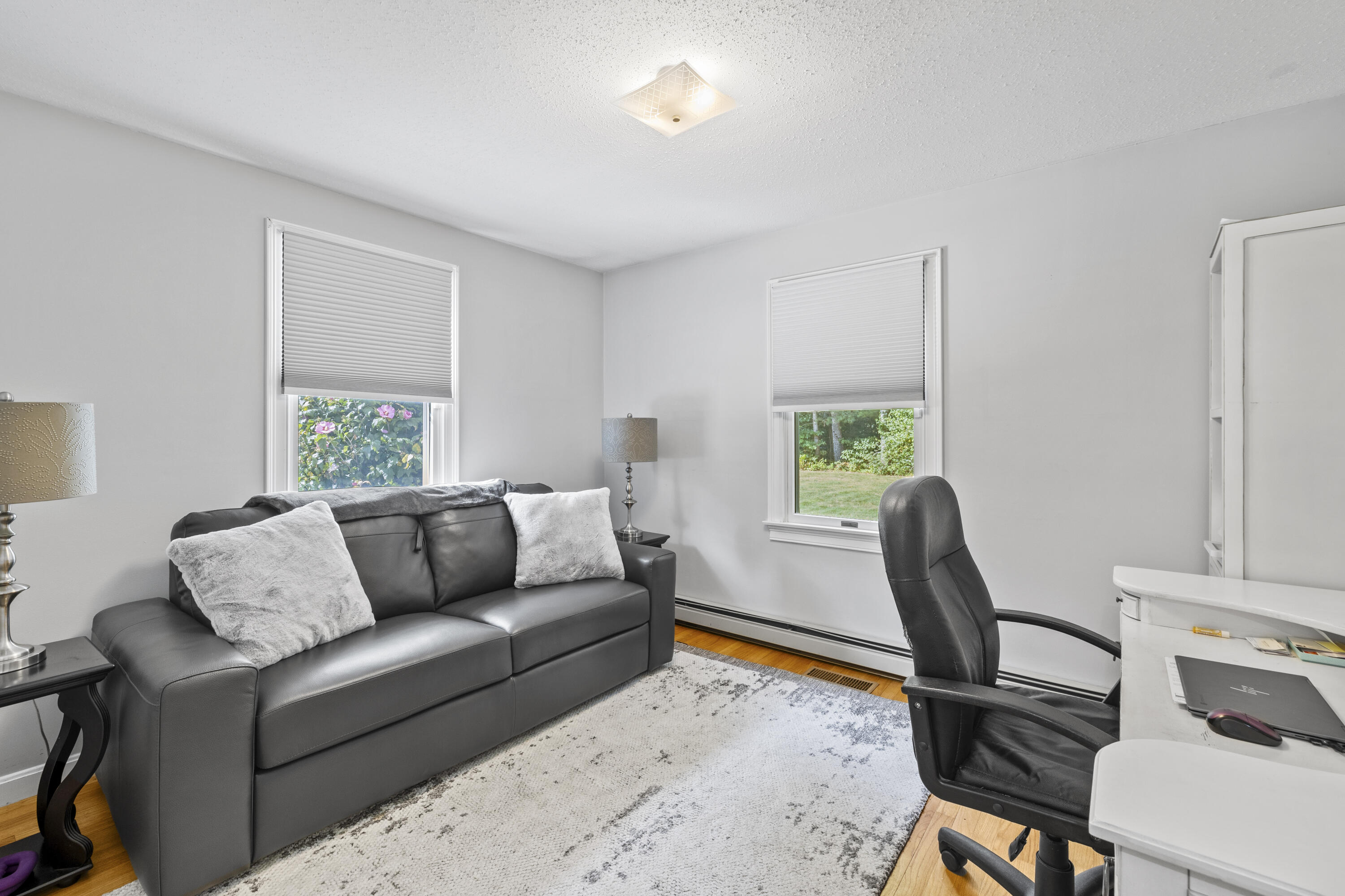 750 Old Barnstable Road Mashpee, MA 02649 - Photo 9 of 30 a living room with furniture and a window