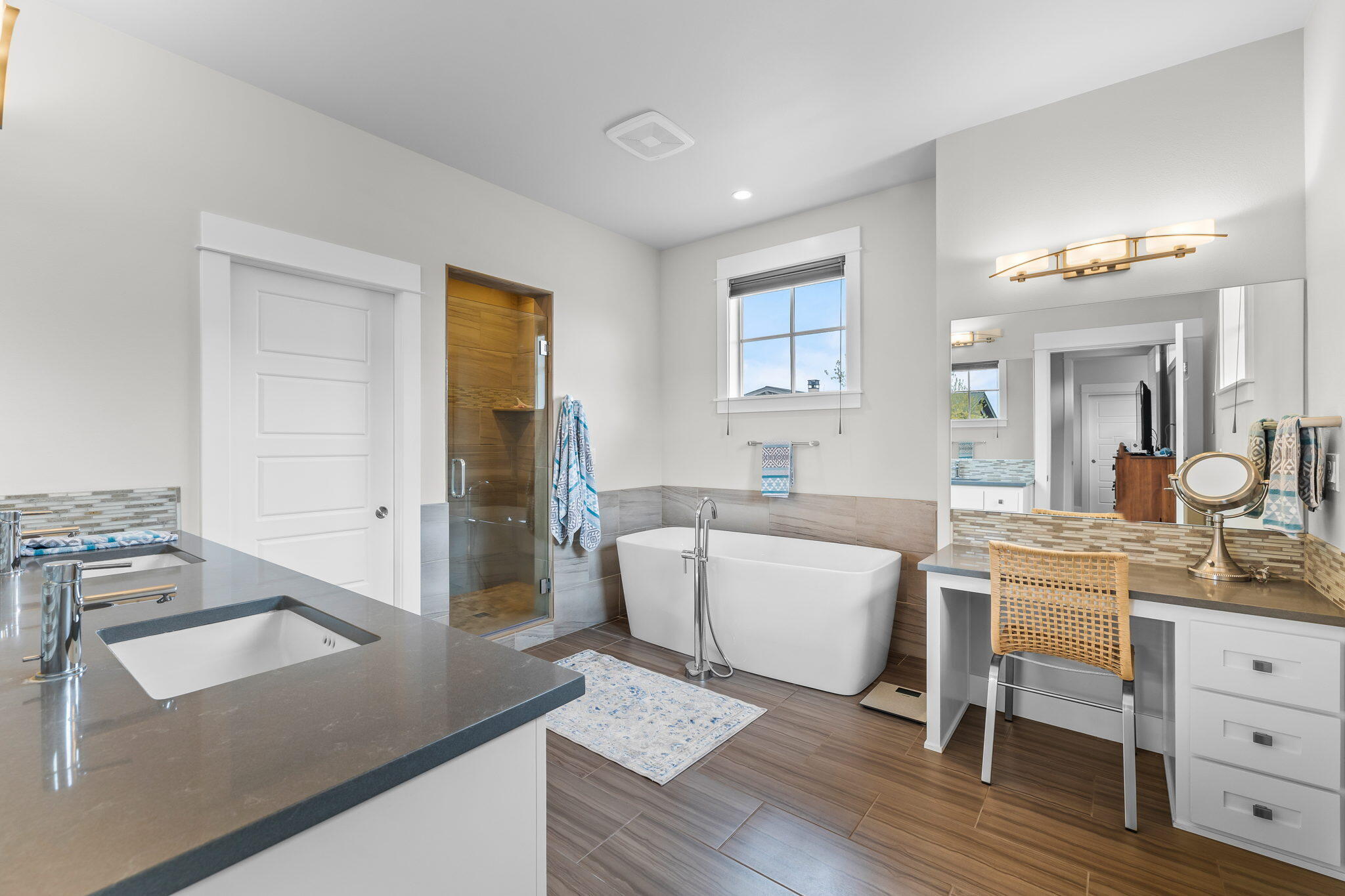 19313 Alianna Loop Bend, OR 97702 - Photo 11 of 29 Spa worthy bath with dual sinks, separate vanity, soaking tub, spacious tiled shower, and water closet.
