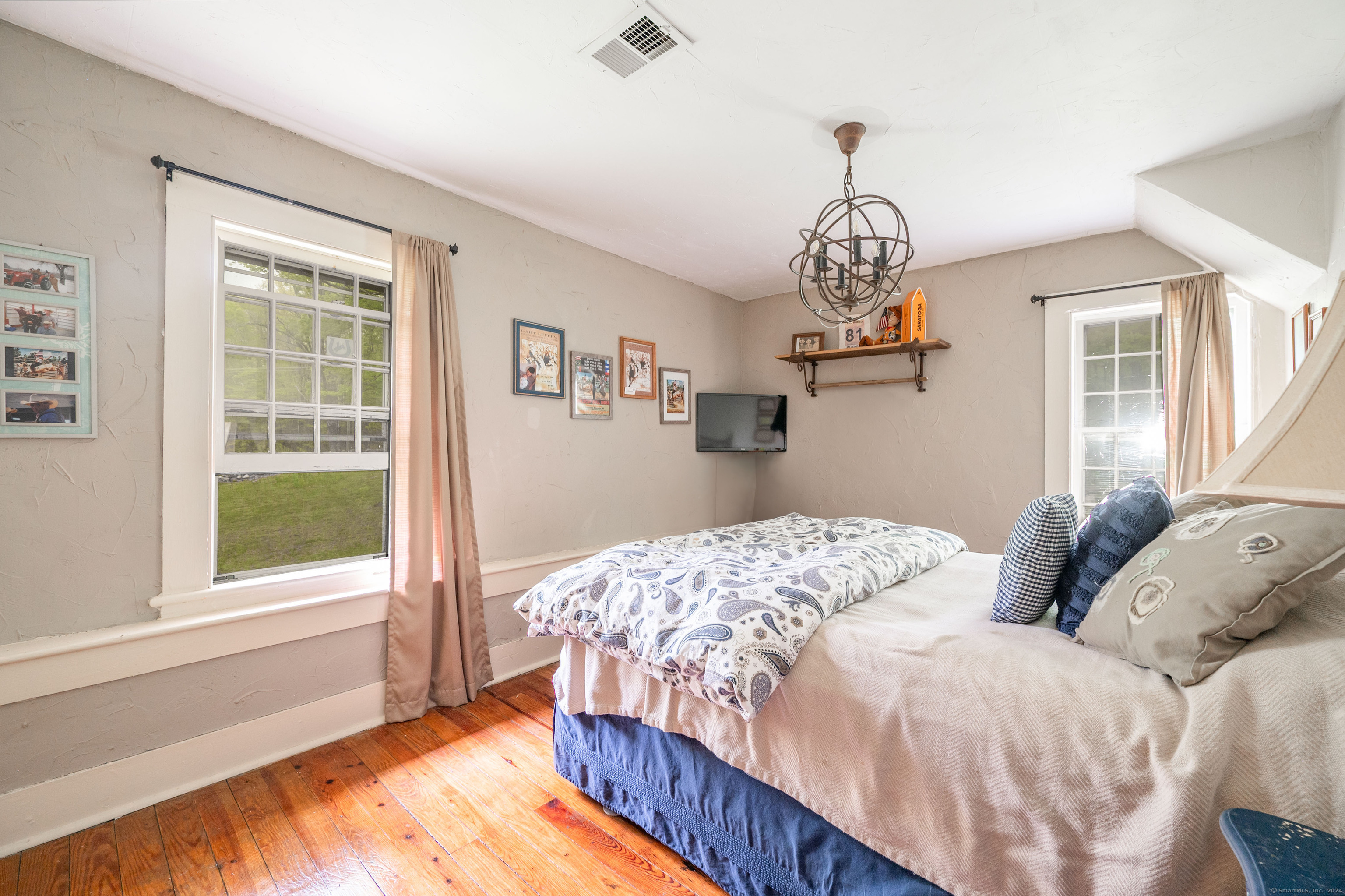 469 Platt Hill Road Winchester, CT 06098 - Photo 15 of 39 a bedroom with bed and a window