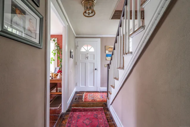 a view of entryway with a front door