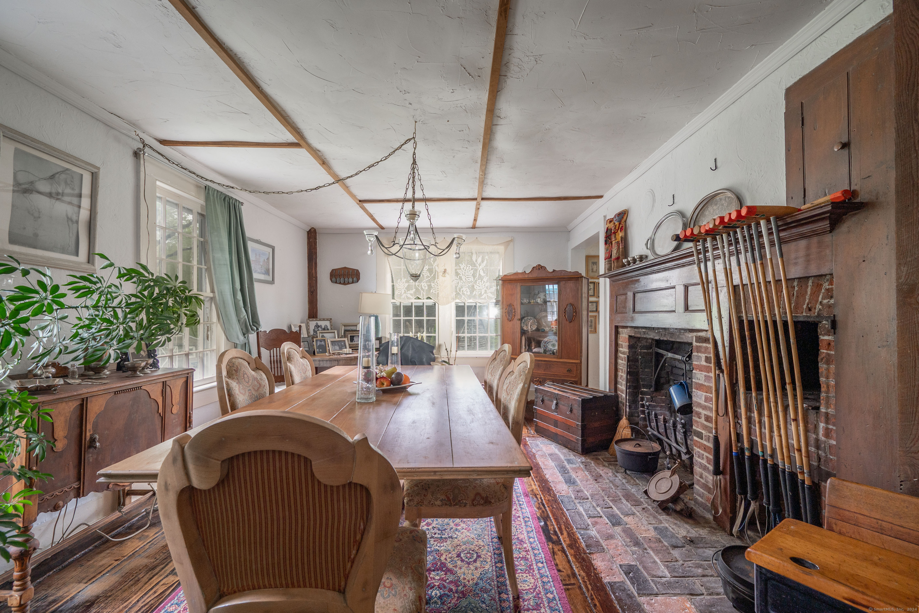 469 Platt Hill Road Winchester, CT 06098 - Photo 23 of 39 a view of a dining room with furniture window and wooden floor