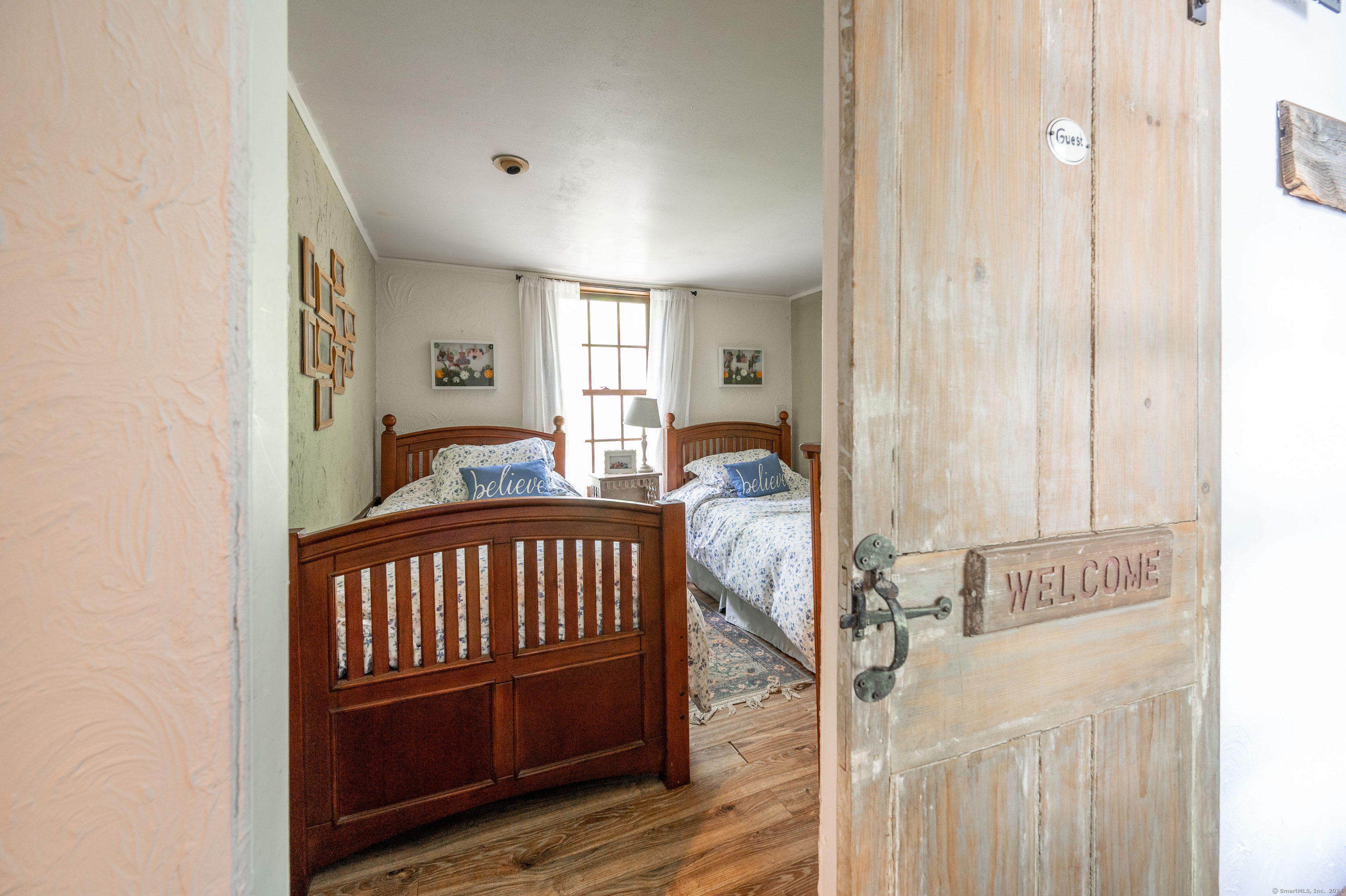 469 Platt Hill Road Winchester, CT 06098 - Photo 29 of 39 a bedroom with furniture and a window
