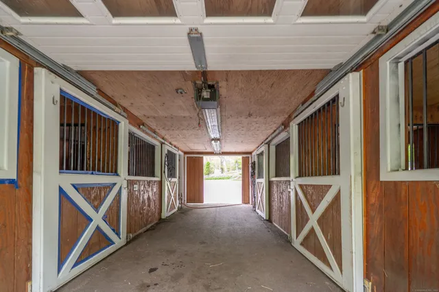 a view of a house with a yard porch and sitting area