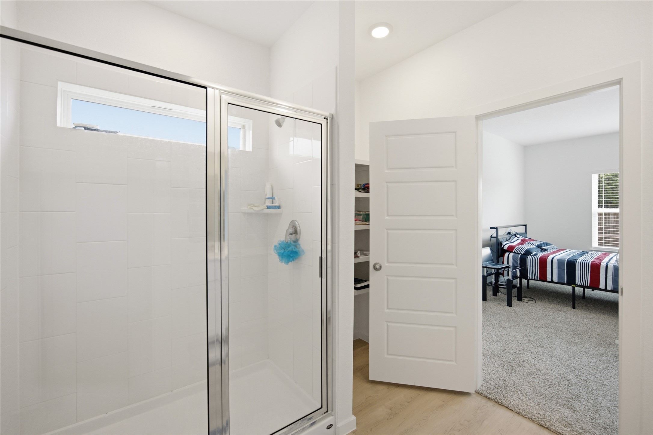 7 Robin Court Angleton, TX 77515 - Photo 12 of 27 Primary shower — Walk-in shower with glass enclosure.