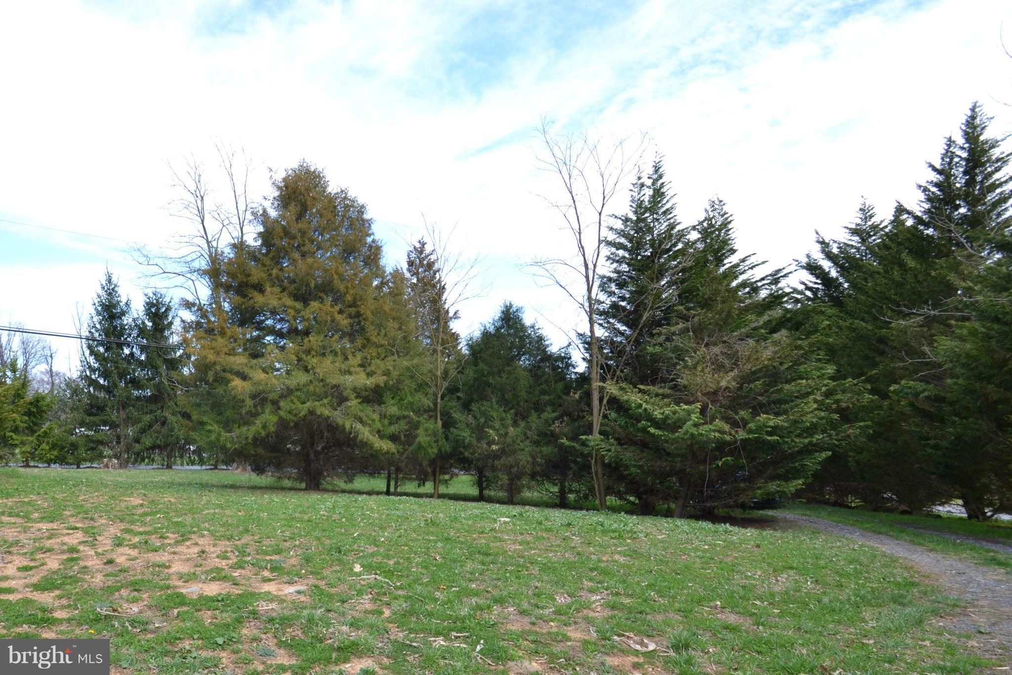 15300 Parrish Road Upperco, MD 21155 - Photo 10 of 30 a view of field with trees in the background