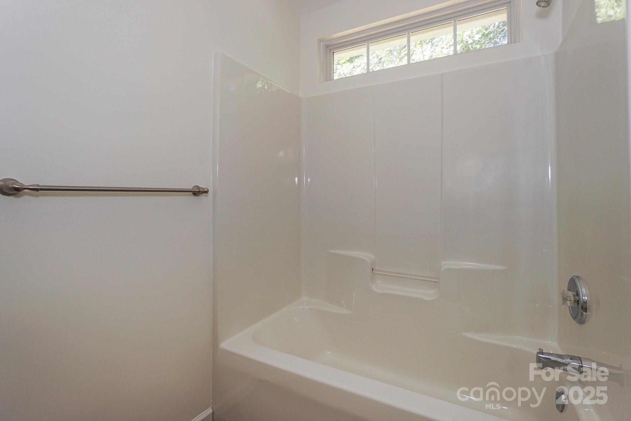 2485 Acadia Court Kannapolis, NC 28083 - Photo 18 of 34 a bathroom with a bathtub
