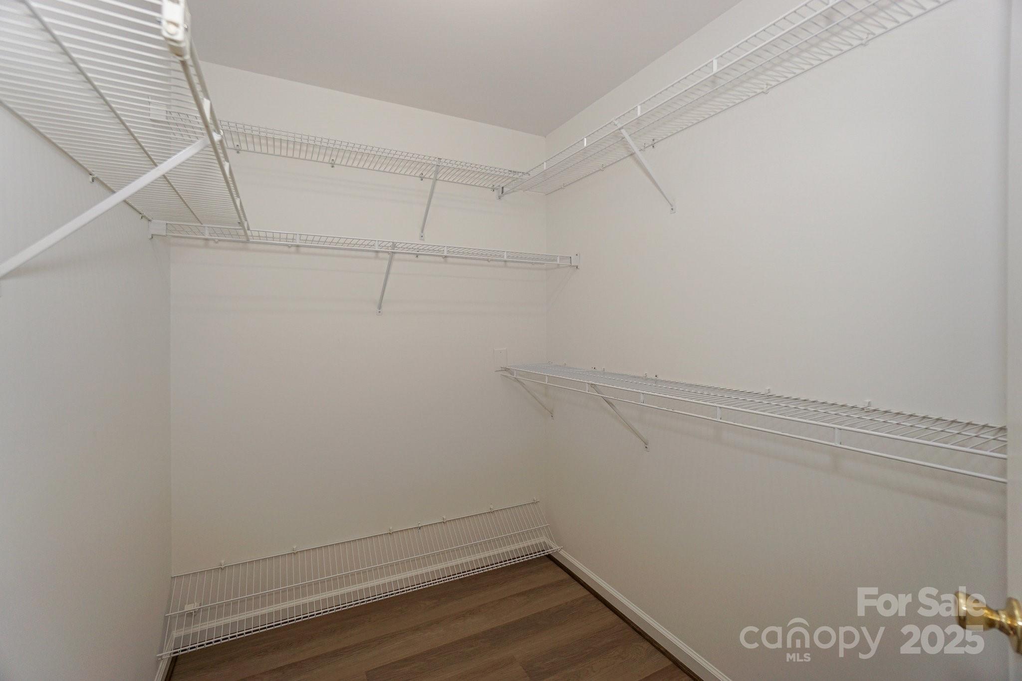 2485 Acadia Court Kannapolis, NC 28083 - Photo 20 of 34 a view of a room with racks on the wall