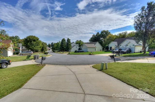 a view of a park with swings and slides