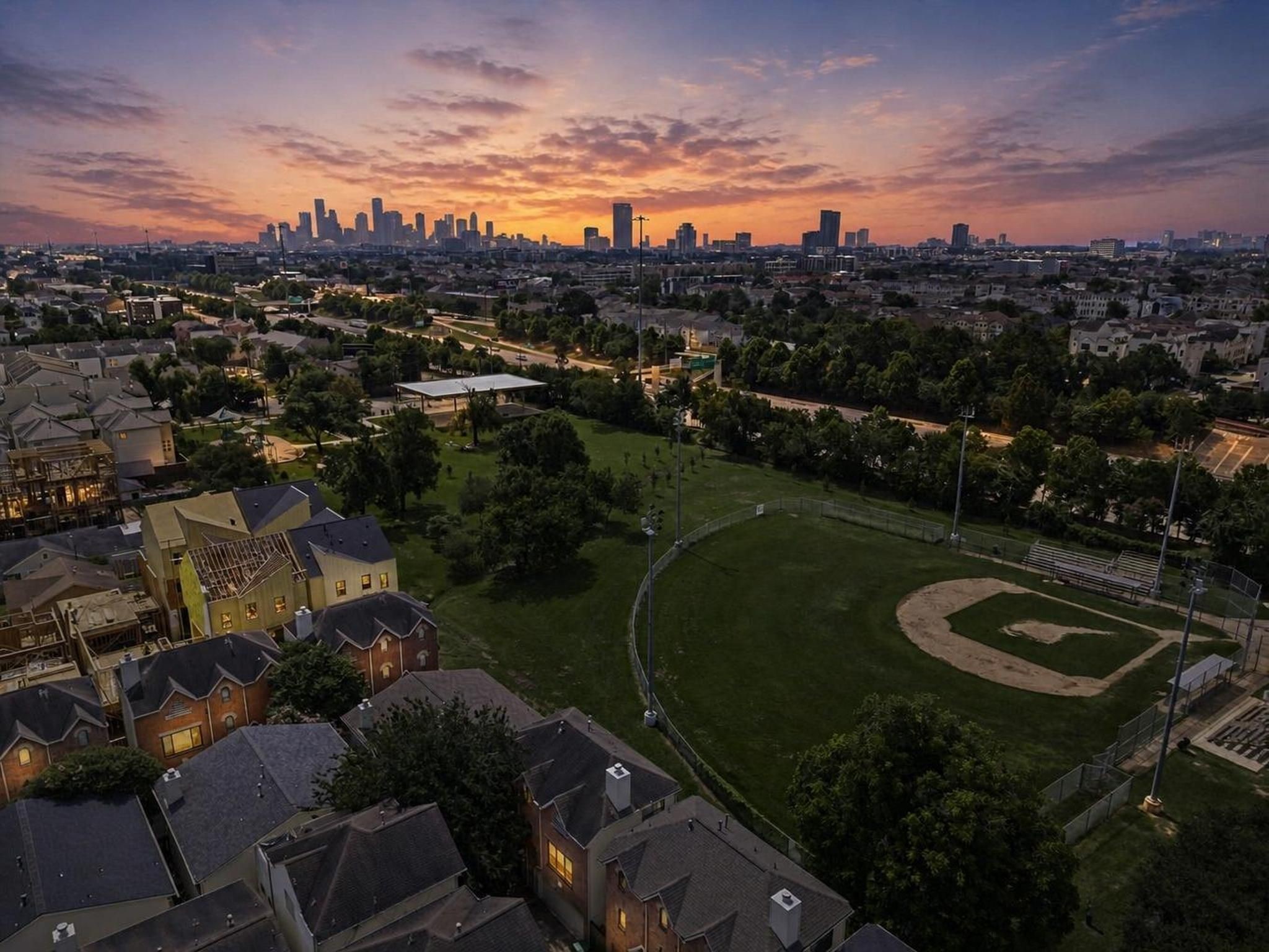2154 Arabelle Street Houston, TX 77007 - Photo 40 of 45 The aerial view captures the home’s Cottage Grove setting with the Houston skyline in the distance. It tells the story of a private residential pocket connected closely to the energy of the city.
