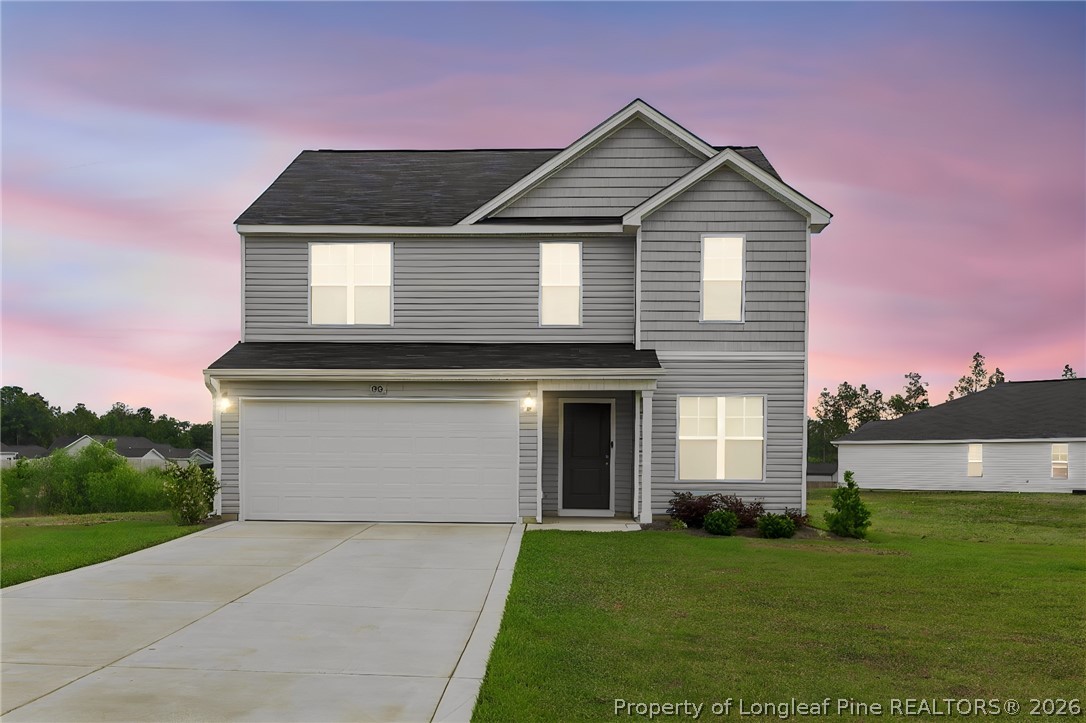 33 Pointer Way Parkton, NC 28371 - Photo 1 of 44 a front view of a house with a yard