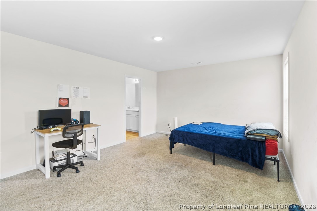 33 Pointer Way Parkton, NC 28371 - Photo 21 of 44 a bedroom with a workspace