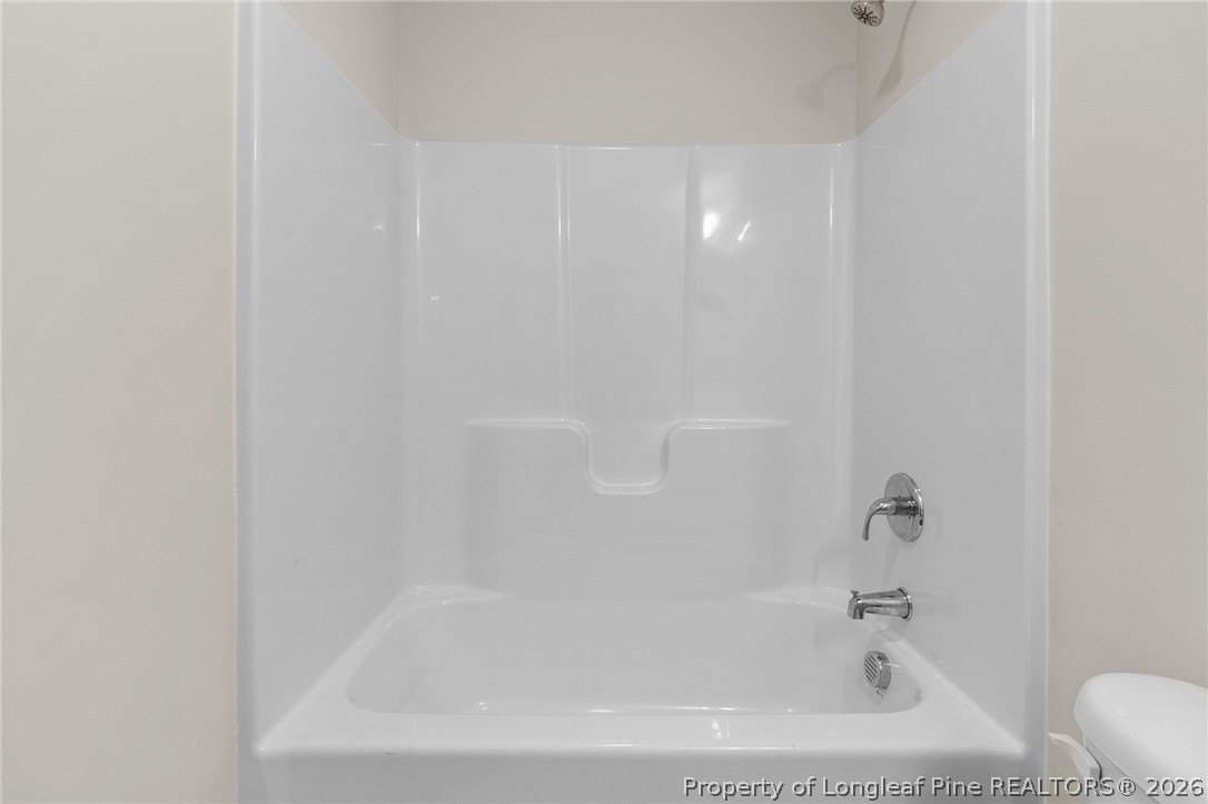 33 Pointer Way Parkton, NC 28371 - Photo 31 of 44 a close up of a bathtub in a bathroom