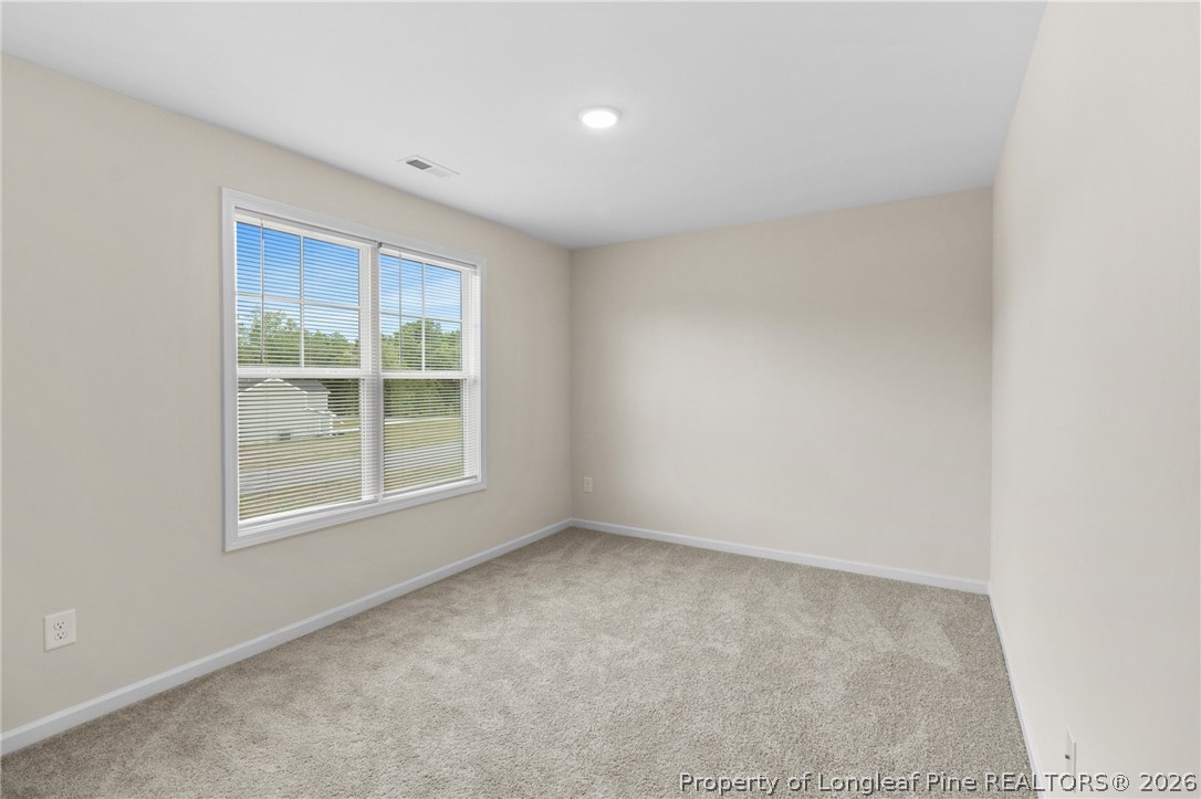 33 Pointer Way Parkton, NC 28371 - Photo 32 of 44 an empty room with a window