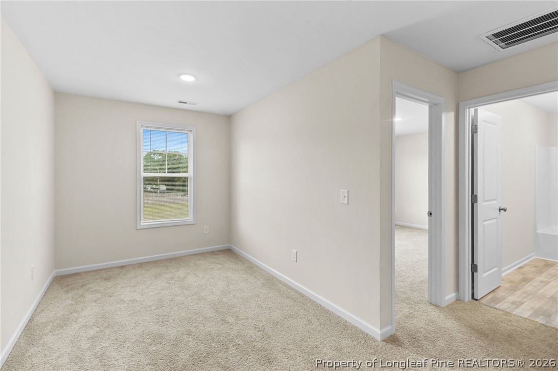 33 Pointer Way Parkton, NC 28371 - Photo 34 of 44 a view of an empty room and window