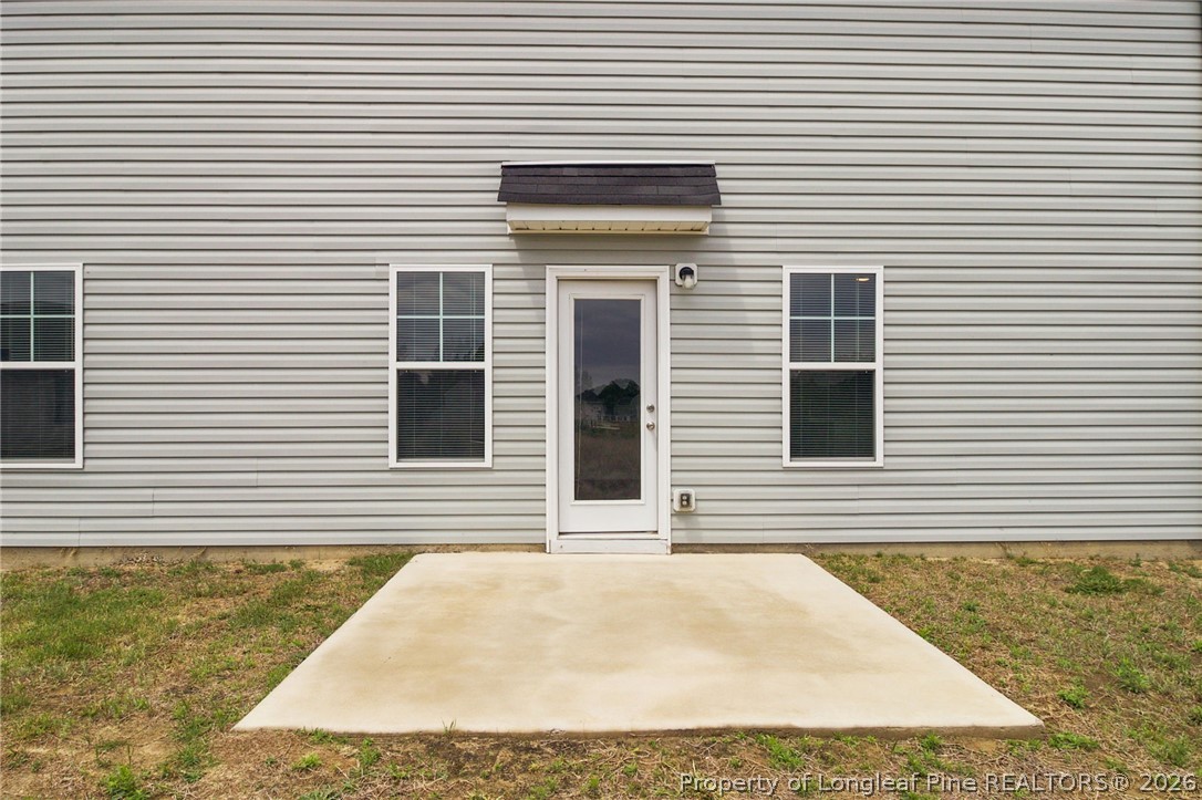 33 Pointer Way Parkton, NC 28371 - Photo 40 of 44 a view of a house with a garage