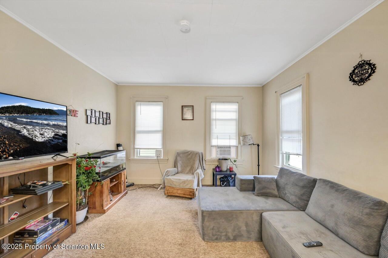 535 Green Ridge Street Scranton, PA 18509 - Photo 41 of 72 a living room with furniture and a flat screen tv