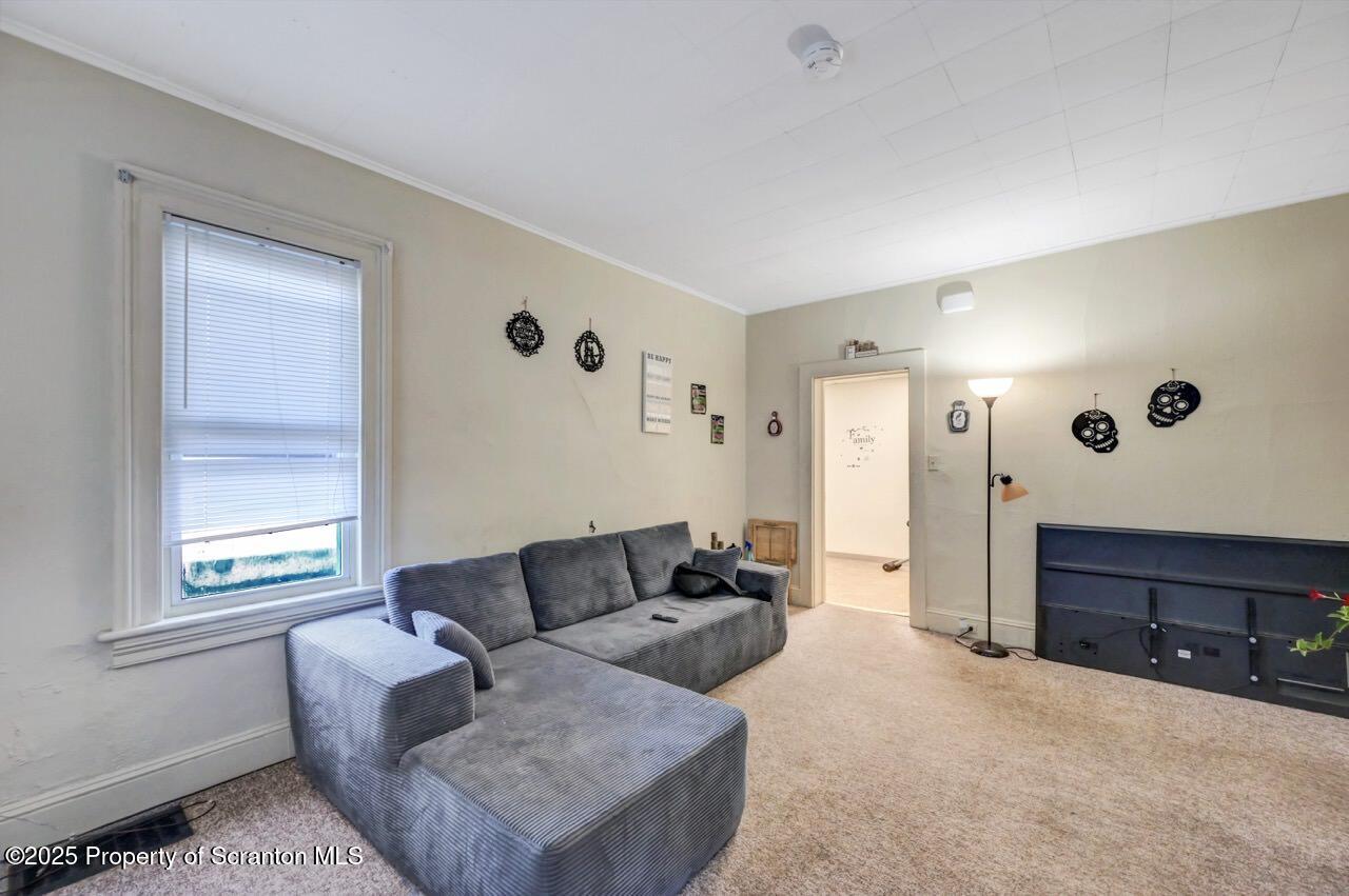 535 Green Ridge Street Scranton, PA 18509 - Photo 43 of 72 a living room with furniture and a window