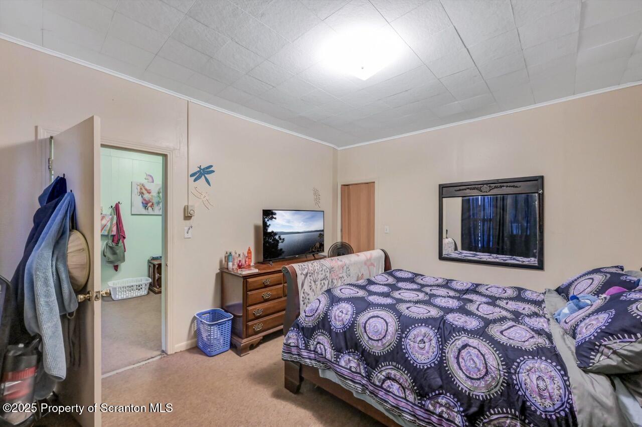535 Green Ridge Street Scranton, PA 18509 - Photo 53 of 72 a bedroom with a bed and a tv
