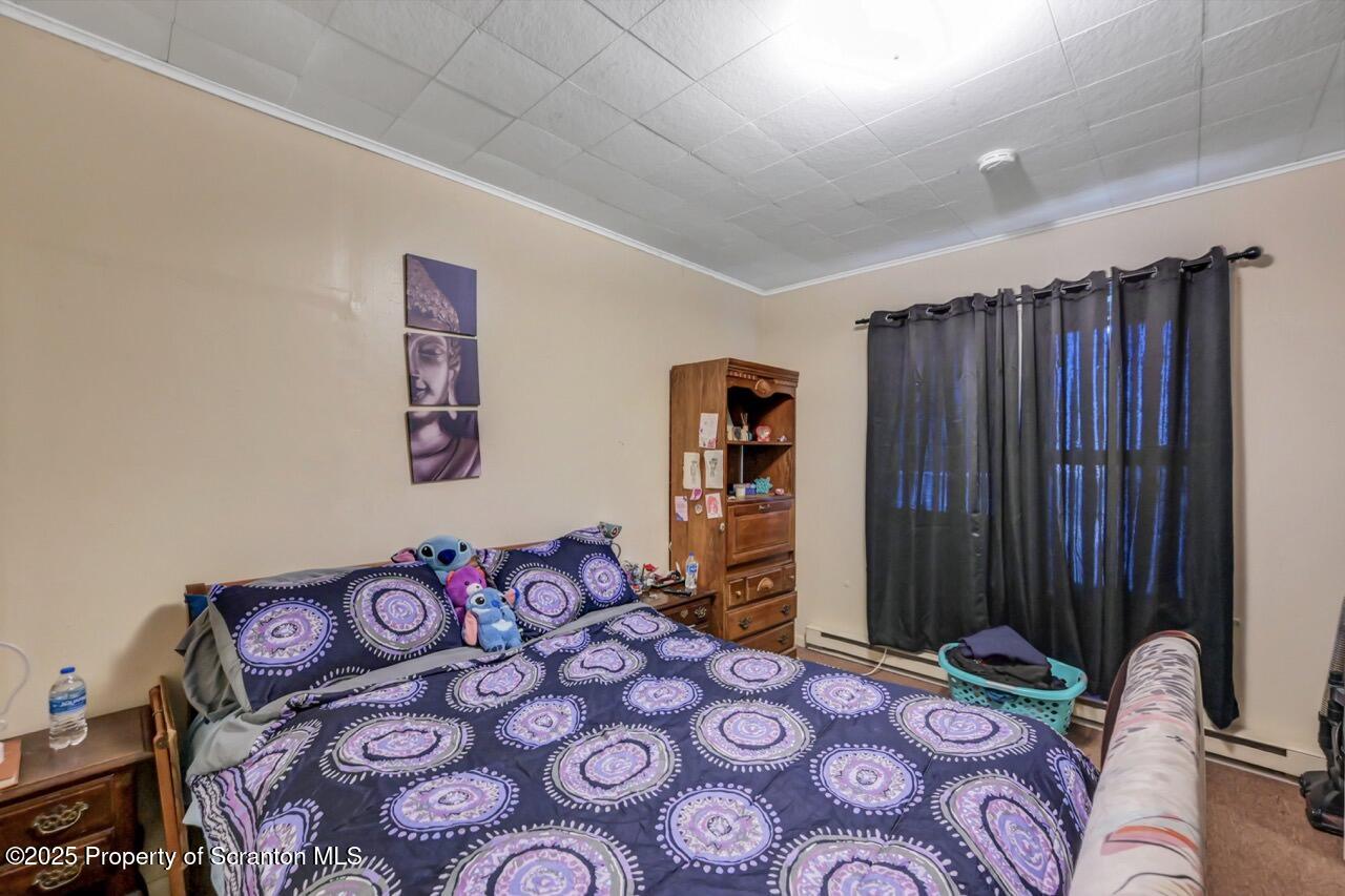 535 Green Ridge Street Scranton, PA 18509 - Photo 54 of 72 a bedroom with bed and a closet