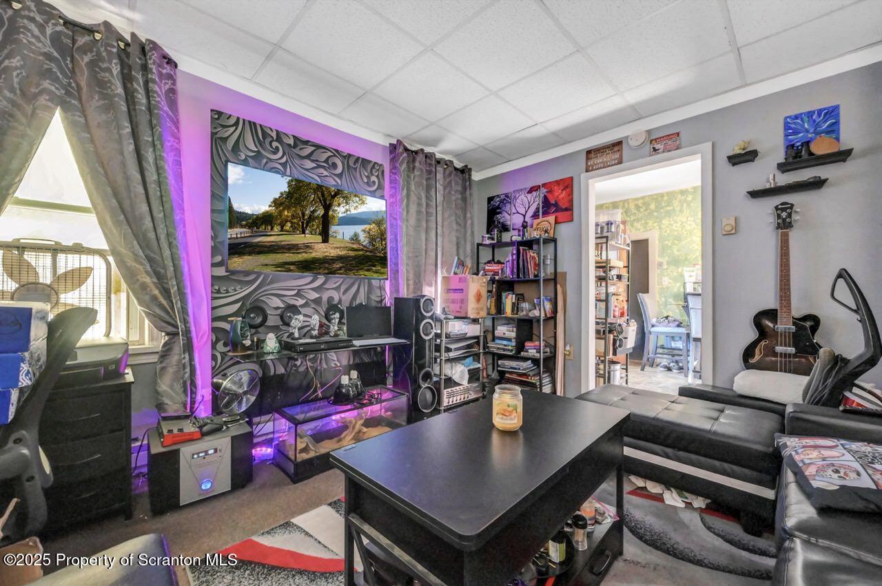 535 Green Ridge Street Scranton, PA 18509 - Photo 59 of 72 a living room with furniture and a flat screen tv
