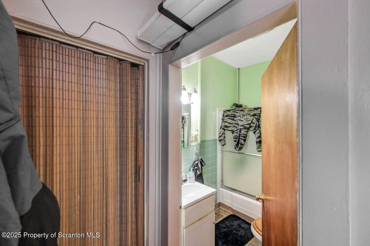 535 Green Ridge Street Scranton, PA 18509 - Photo 62 of 72 a bathroom with a shower and a sink