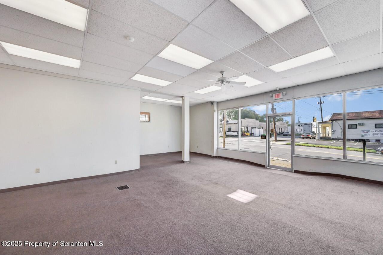 535 Green Ridge Street Scranton, PA 18509 - Photo 10 of 72 a view of an empty room with window and screen tv