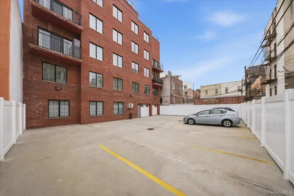 a view of a street with a building