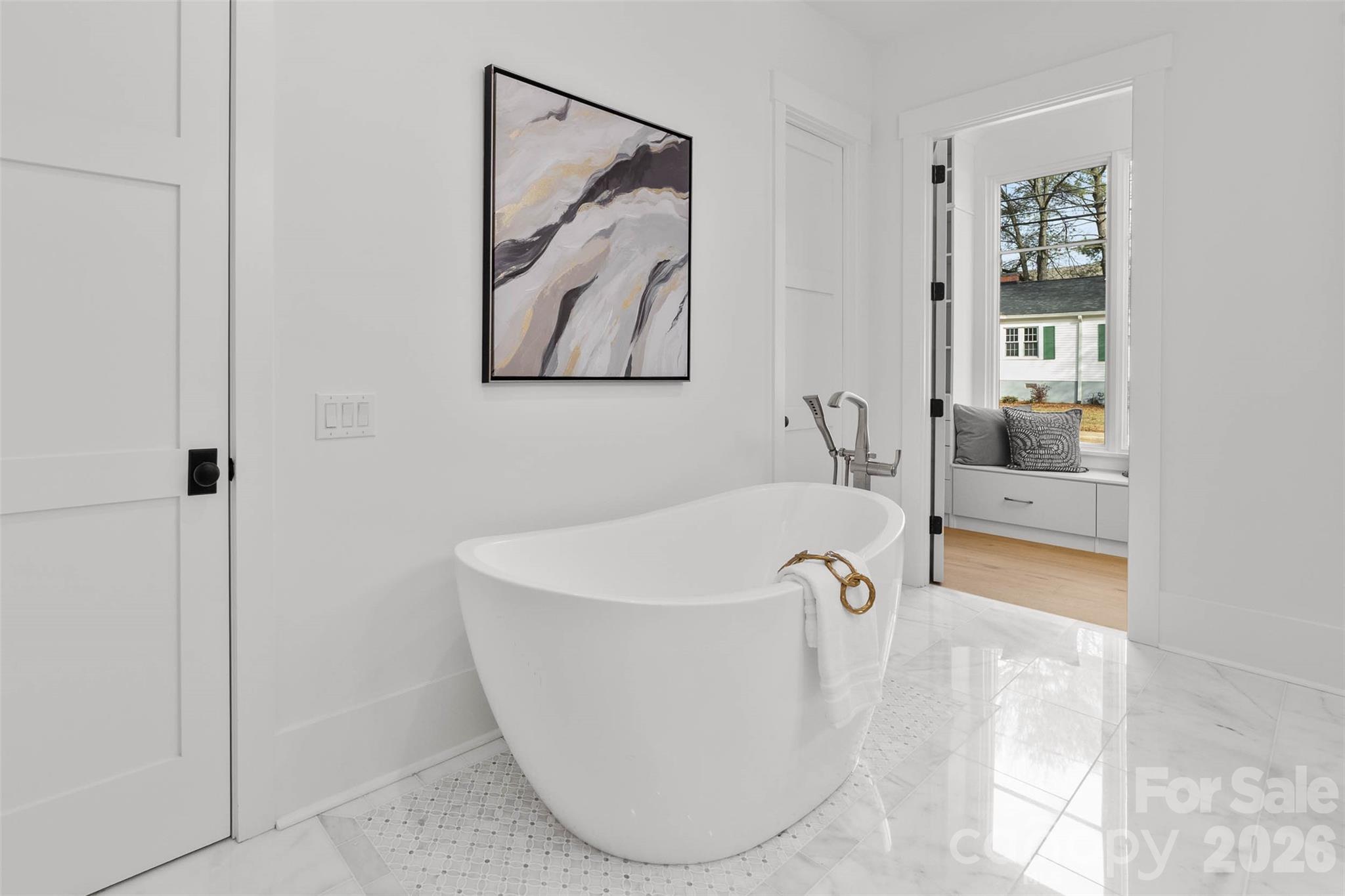 216 Walnut Street Davidson, NC 28036 - Photo 20 of 48 a white bath tub sitting in a bathroom