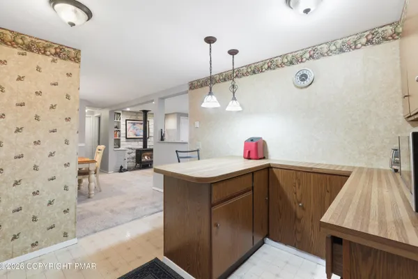 a utility room with cabinets and a sink