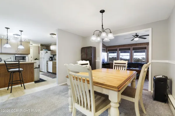 a view of a dining room and livingroom view
