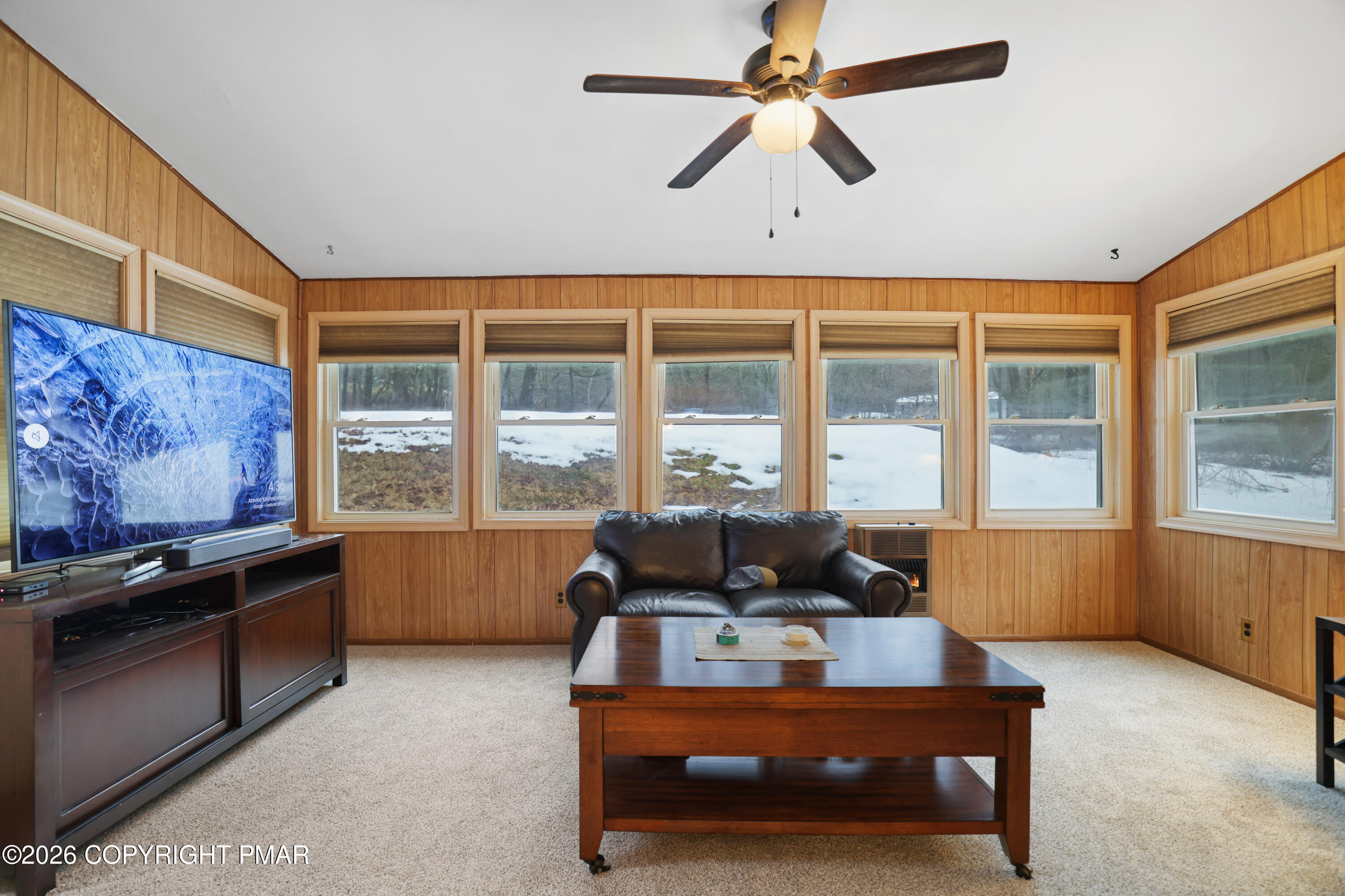 1107 Mink Trail Bushkill, PA 18324 - Photo 20 of 42 a living room with furniture and a window