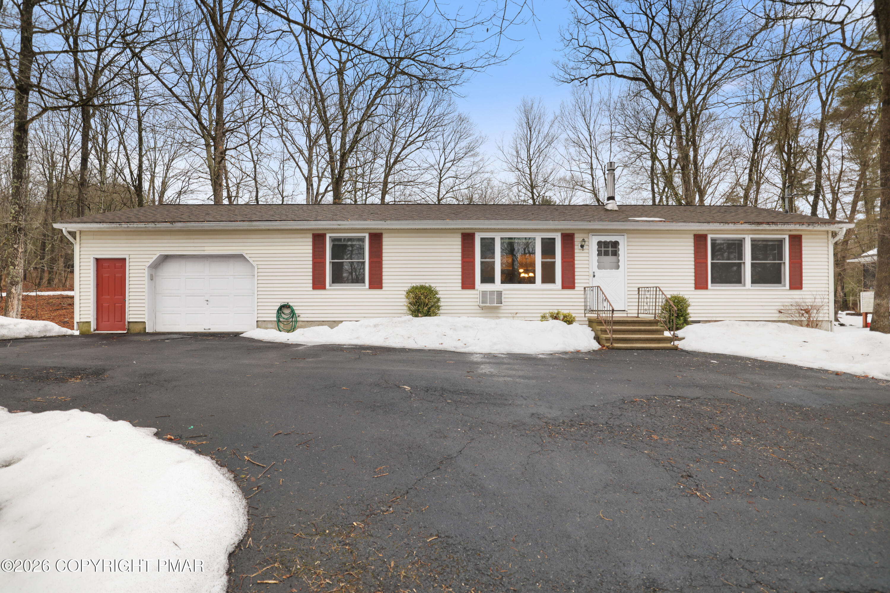 1107 Mink Trail Bushkill, PA 18324 - Photo 41 of 42 front view of house with a yard