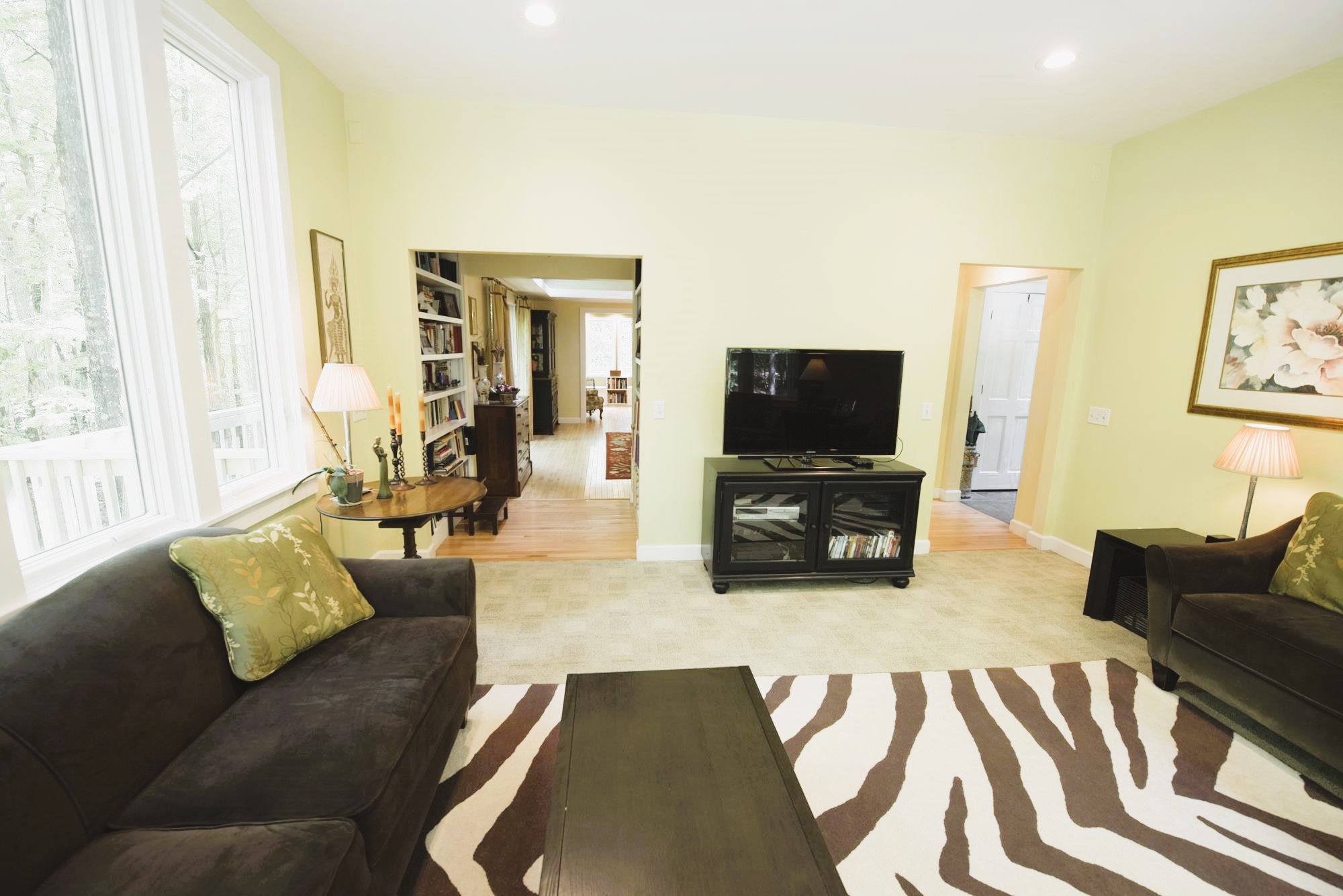 727 Deepwoods Road Sewanee, TN 37375 - Photo 4 of 21 a living room with furniture and a flat screen tv