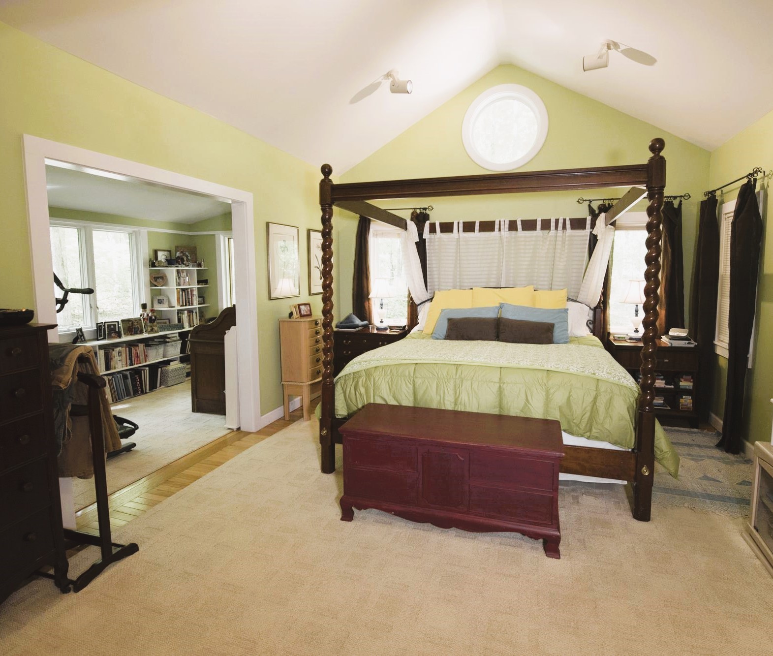 727 Deepwoods Road Sewanee, TN 37375 - Photo 8 of 21 a bedroom with a bed mirror and a chandelier