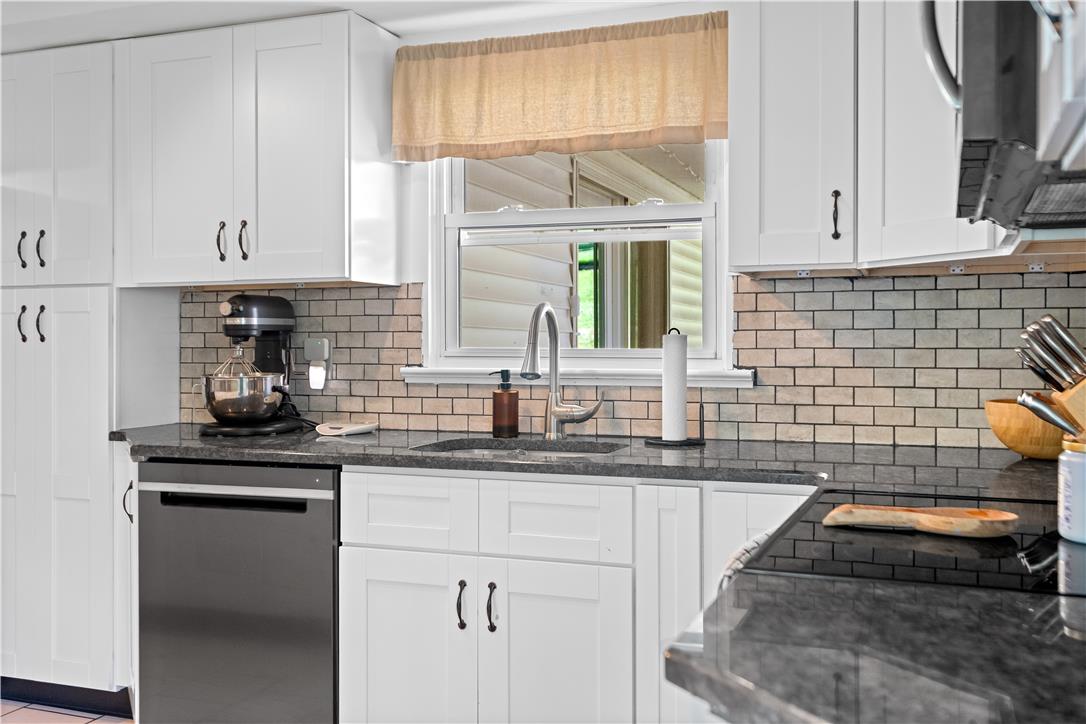 50 Kohls Road Northampton, PA 18067 - Photo 11 of 54 Clean lines and modern finishes define this well-appointed kitchen.