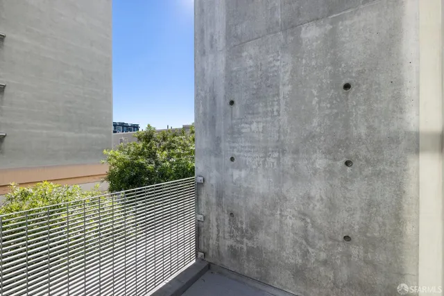 a view of balcony with a glass door