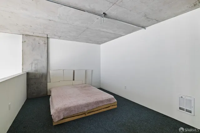 a utility room with closet dryer and washer