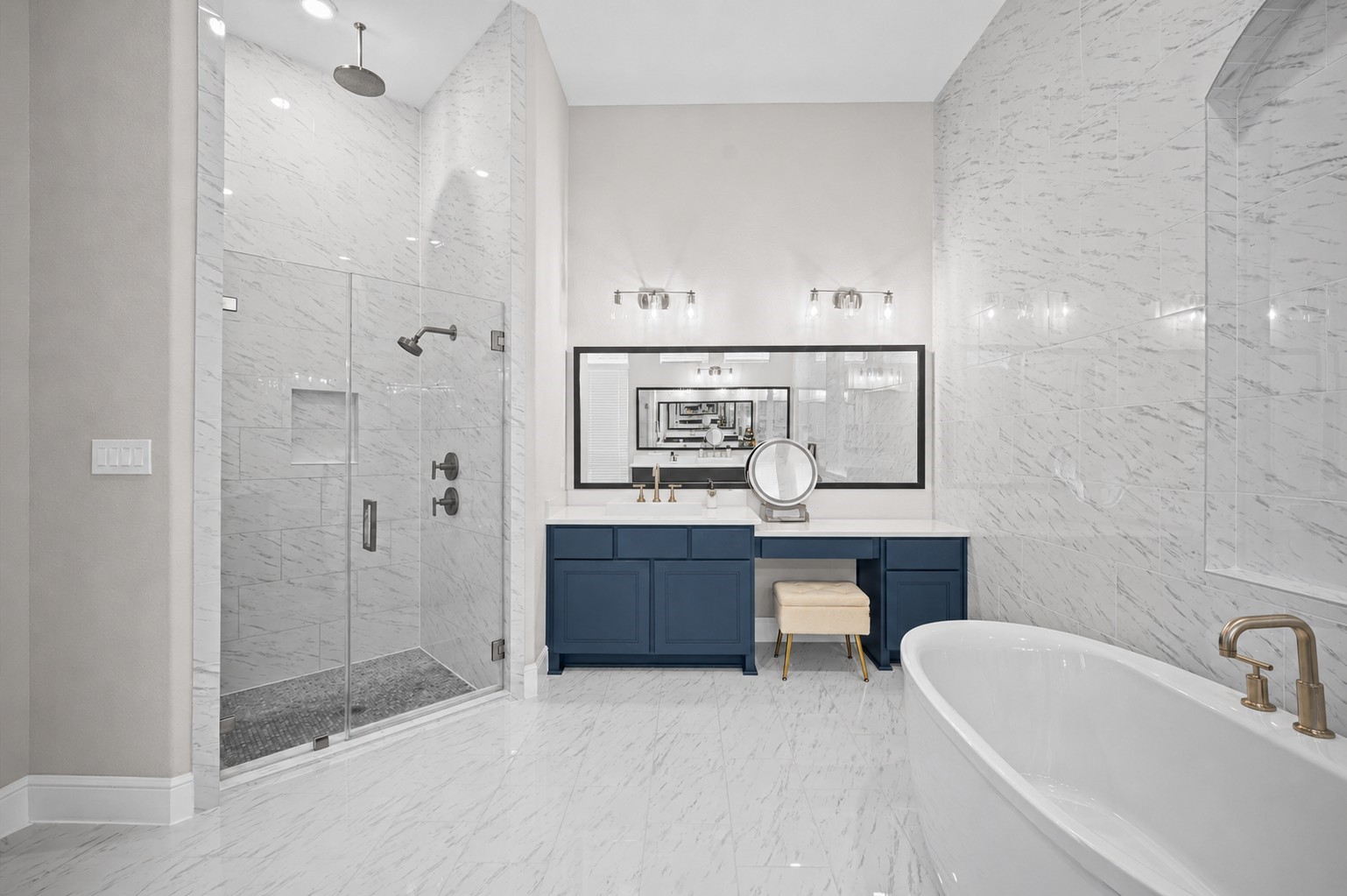 4923 Grapevine Lane Manvel, TX 77578 - Photo 26 of 49 a bathroom with a bathtub shower sink and mirror