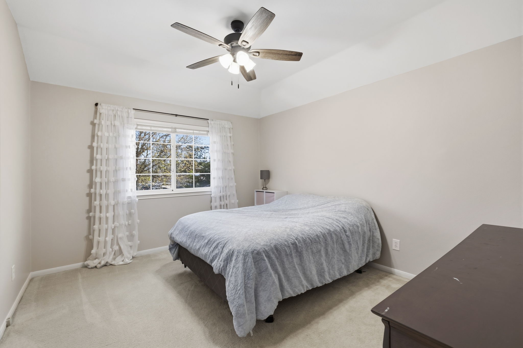 20322 Cembra Walk Spring, TX 77379 - Photo 30 of 47 a bedroom with a bed and a window