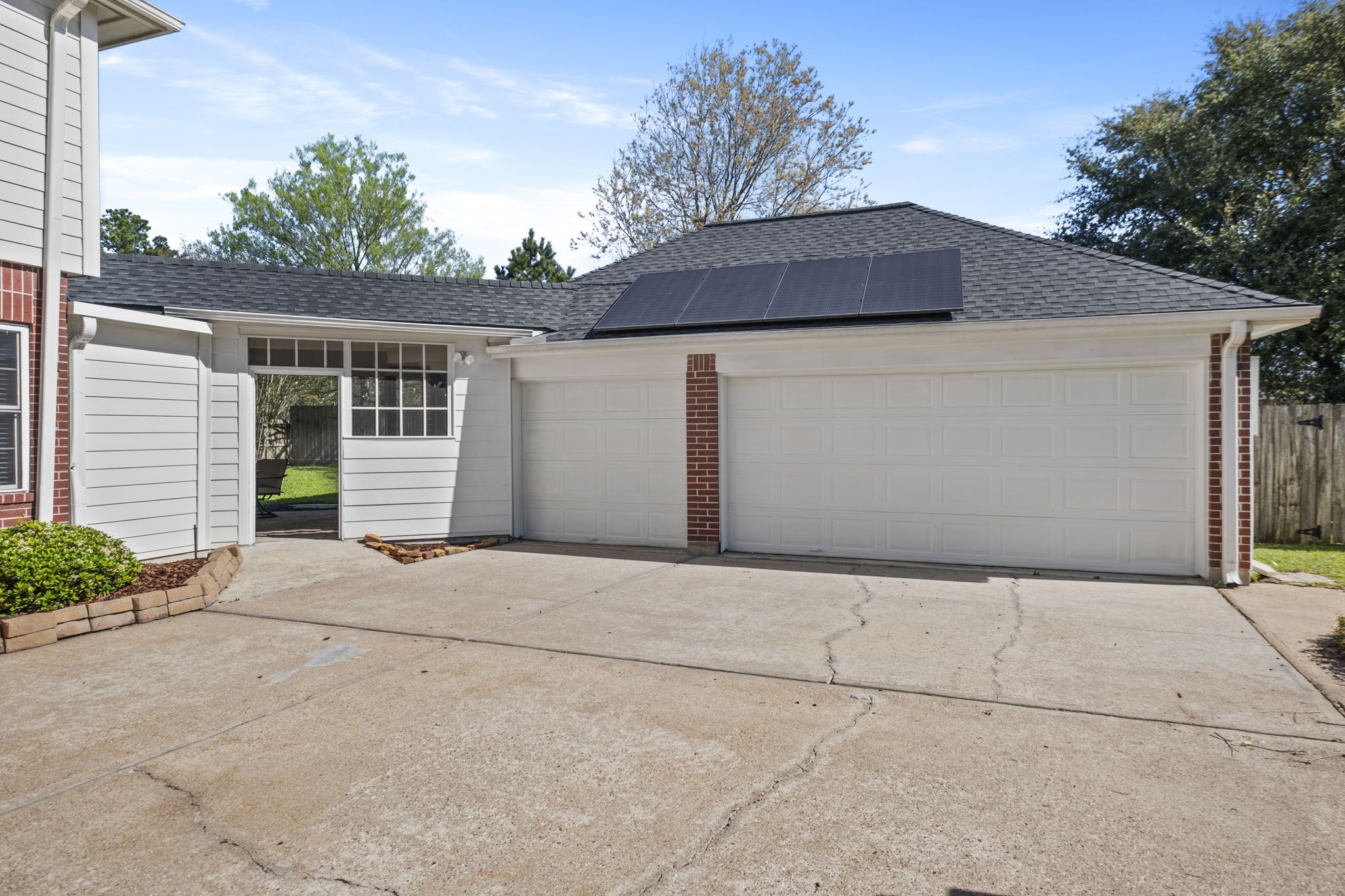 20322 Cembra Walk Spring, TX 77379 - Photo 39 of 47 a front view of a house with a yard and garage