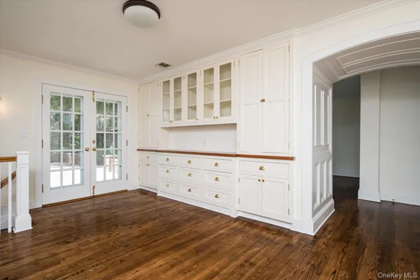 a view of a livingroom with wooden floor