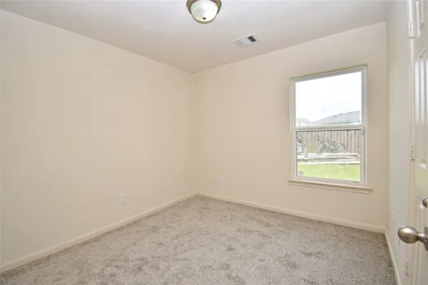 an empty room with a window