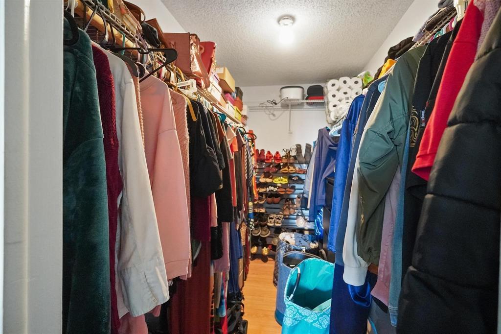 4174 Inverrary Drive, Unit 701 Lauderhill, FL 33319 - Photo 15 of 24 a view of walk in closet with clothes and shoes