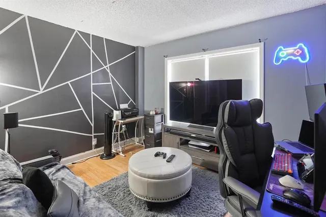 a room with furniture and gym equipment