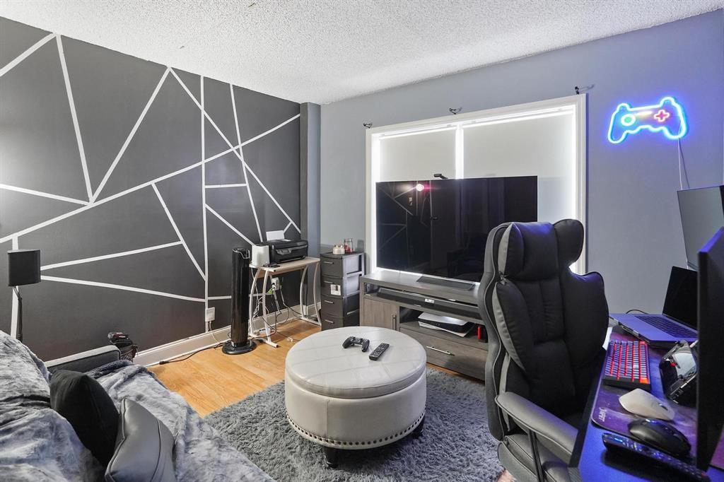 4174 Inverrary Drive, Unit 701 Lauderhill, FL 33319 - Photo 17 of 24 a room with furniture and gym equipment