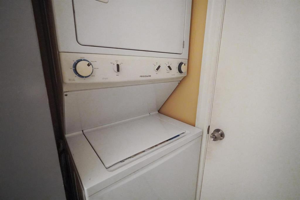 4174 Inverrary Drive, Unit 701 Lauderhill, FL 33319 - Photo 21 of 24 a close up view of a washer and dryer