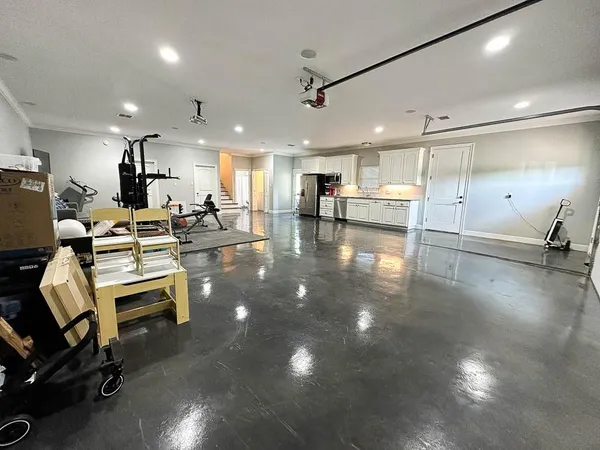 a view of entryway with wooden floor and windows
