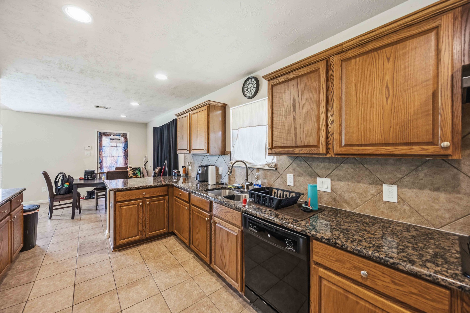 6802 Travis Street Manvel, TX 77578 - Photo 9 of 16 Kitchen leading to breakfast area